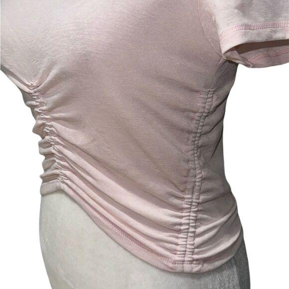FREE PEOPLE MOVEMENT WOMEN’S TOPS IN SMALL COLOR PALE PINK SHORT SLEEVE NWOT - Picture 3 of 3